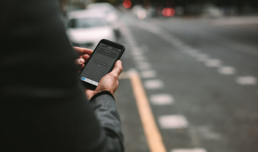 Photo of a Man Holding Phone